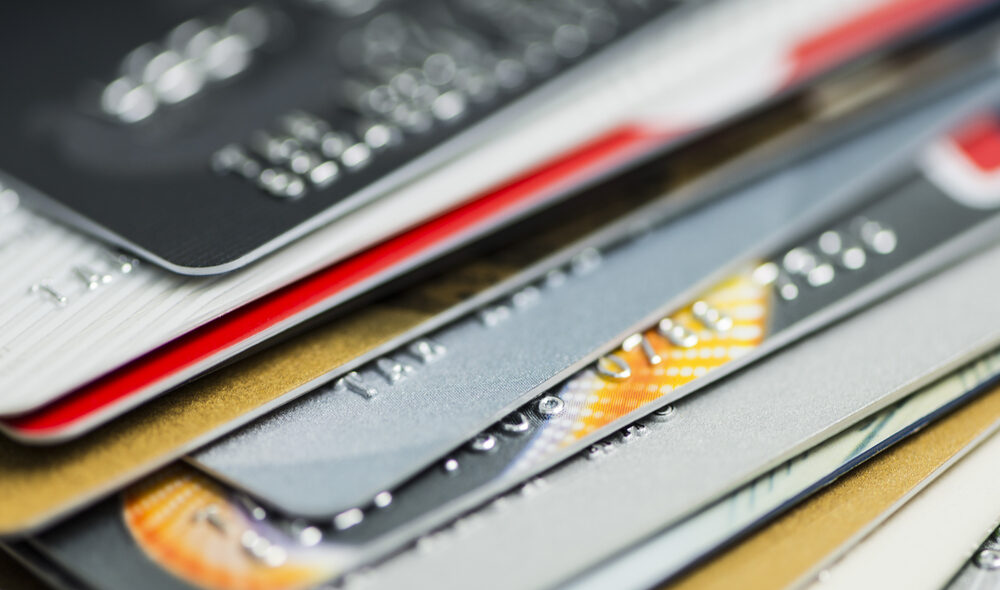 Close-up of a stack of multi-coloured credit cards