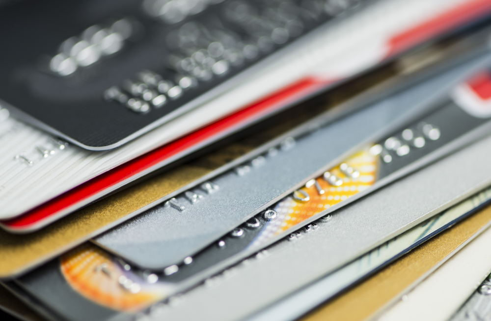 Close-up of a stack of multi-coloured credit cards