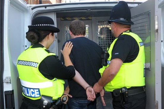 Police arresting a young man for blog explaining what do police say when they arrest you