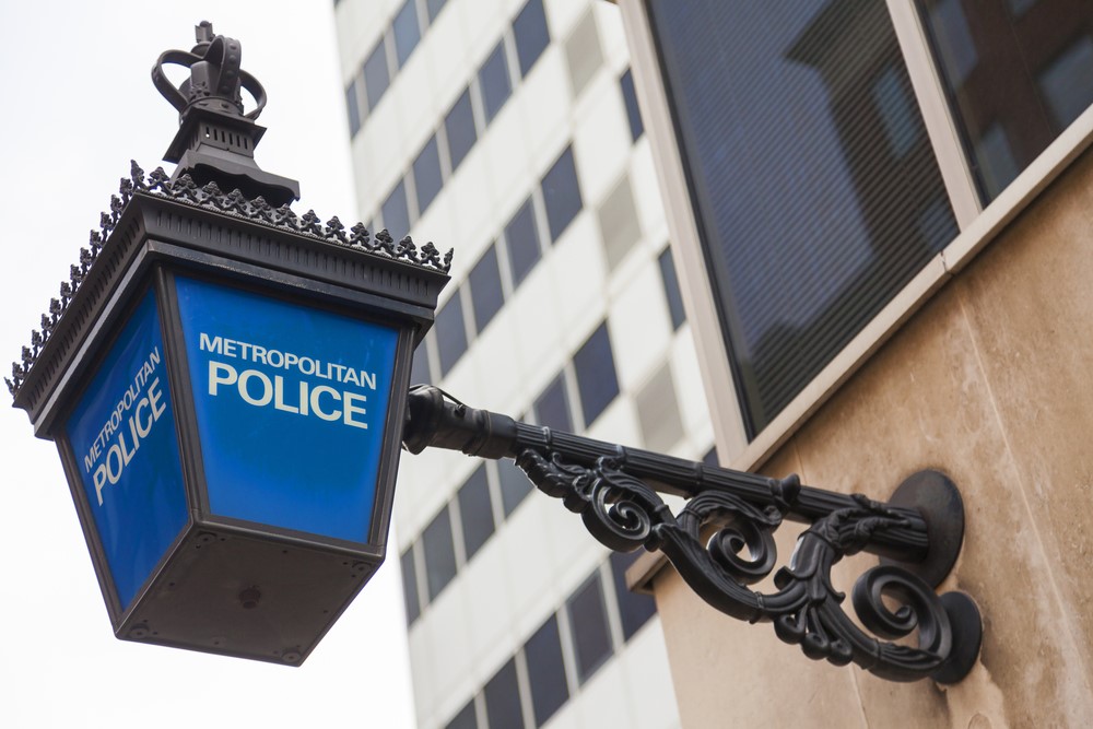 Close up image of a blue Metropolitan police lamp