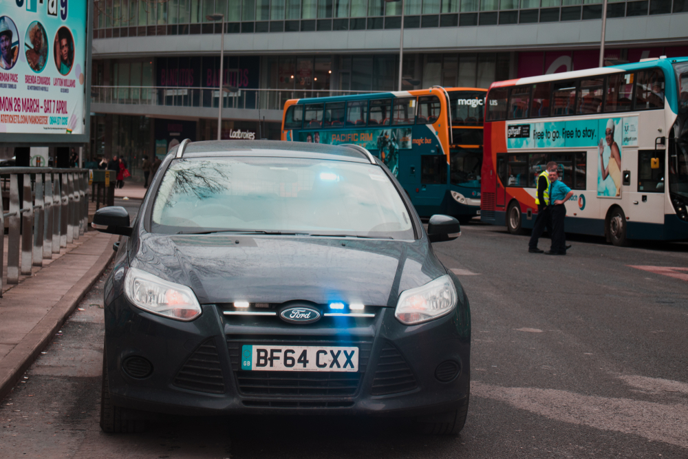 unmarked car with blue lights for blog about do you have to stop for an unmarked police car?