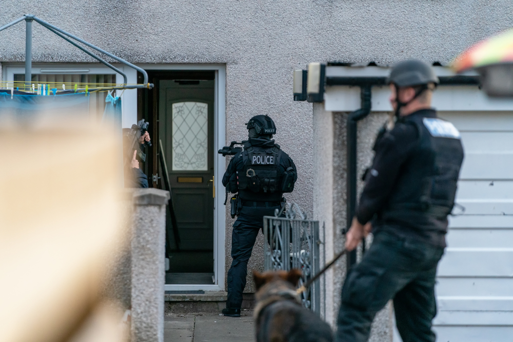 Armed officers await entry of residential house in blog about can police enter your home in the uk?