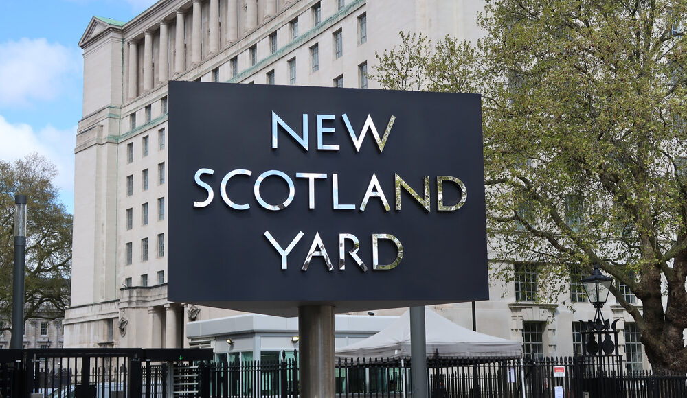 Actions against the police case finally receives apology from Scotland Yard Scotland Yard sign stands in front of building.