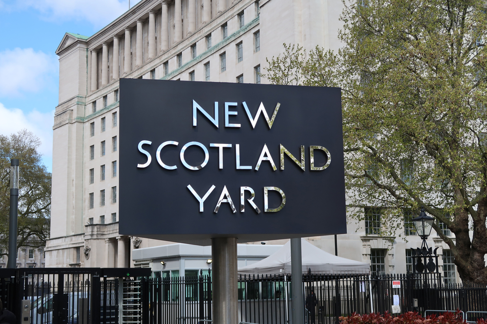 Actions against the police case finally receives apology from Scotland Yard Scotland Yard sign stands in front of building.