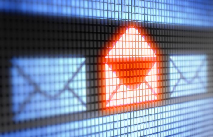 Image of a screen with a red open email symbol next to two blue closed email symbols