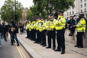 Ten police officers line up down Downing Street amidst Black Lives Matter protests in London.