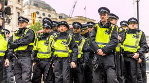 A crowd of riot police in London.