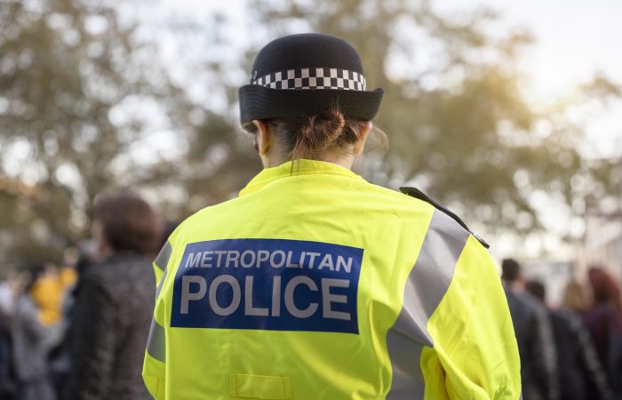 A police officer in a hi-visibility jacket in London.