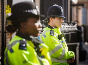 Two metropolitan police officers on duty in London.
