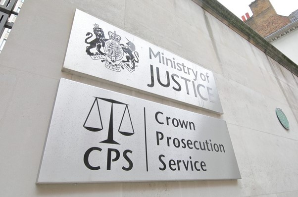 Image of the Ministry of Justice sign and Crown Prosecution Service sign