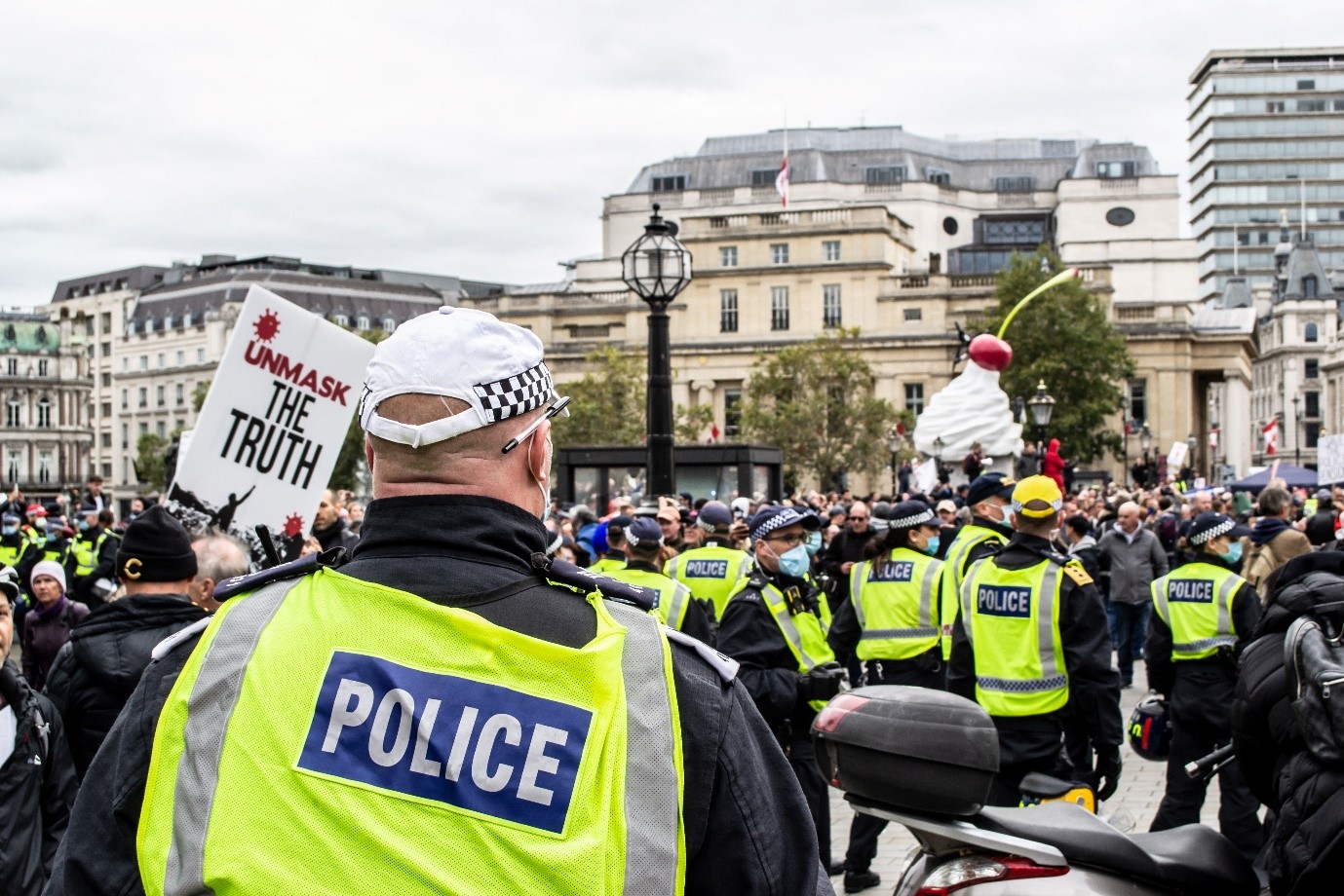 Picture of a COVID protest being policed in the UK
