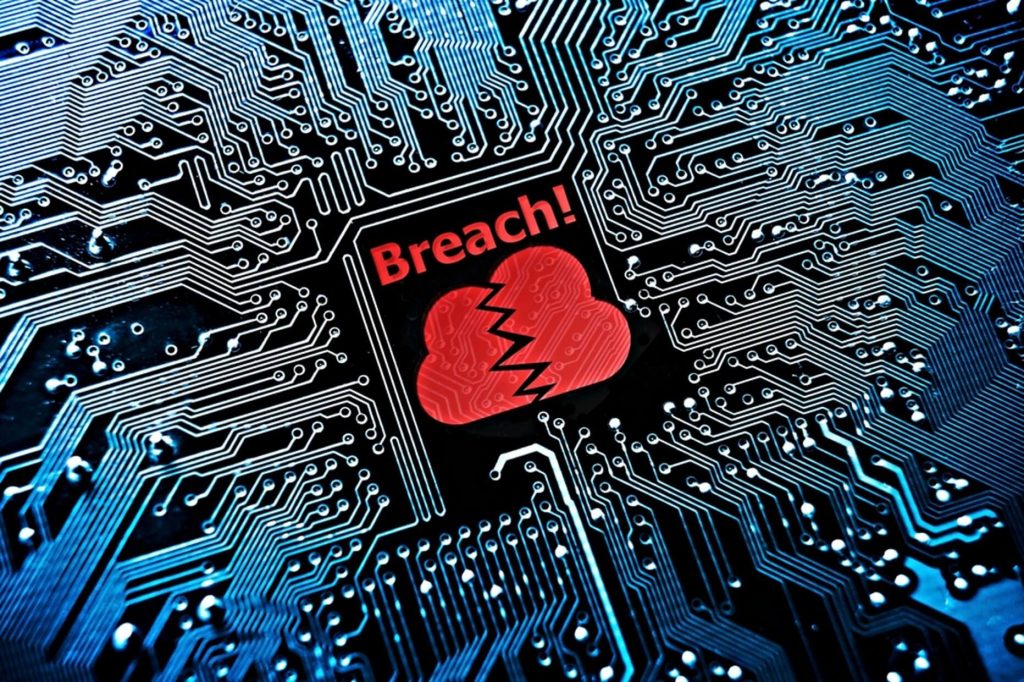 Capita data breaches concept image. A circuit board with blue lines leading toward a read broken cloud symbol with the word 'Breach!' written above it.