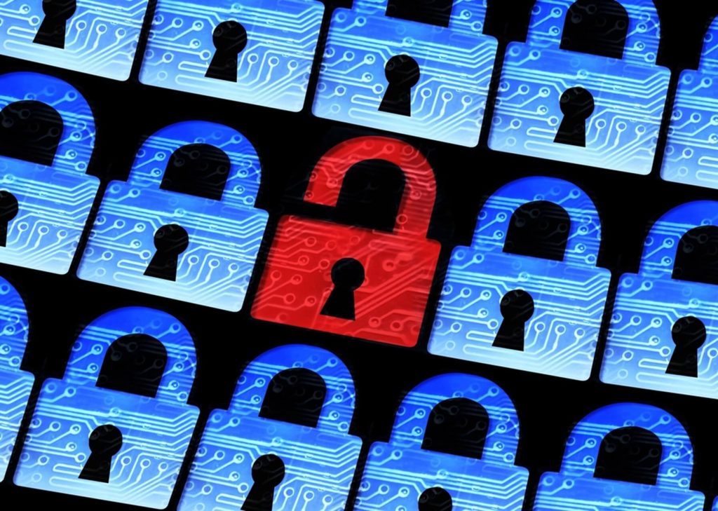 Lines of blue padlock symbols on a screen with a single red unlocked padlock in the middle representing a breach.