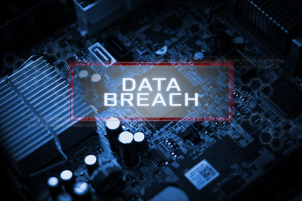 Data breach concept image. A picture of a circuit board with the text 'Data Breach' on top of it.