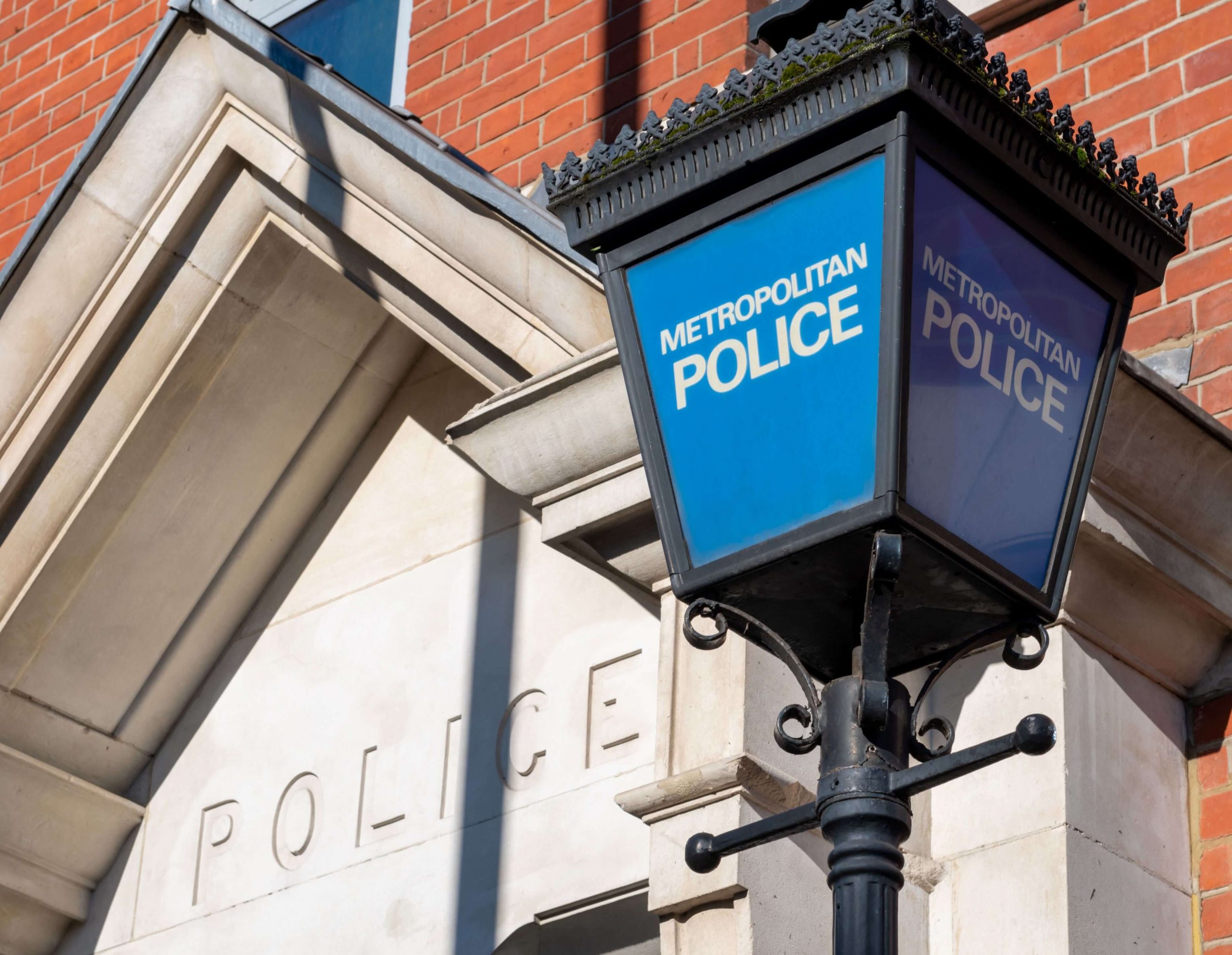 Picture of a Metropolitan Police station with a blue light outside
