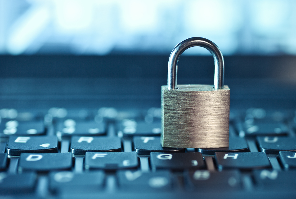 Computer security concept, a padlock on a keyboard