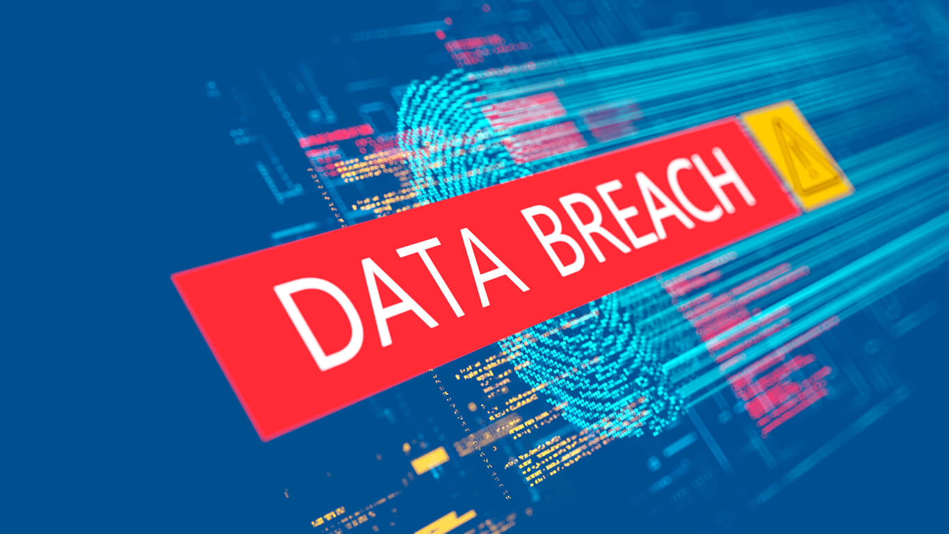 Data breach image. Graphic of a blue digital fingerprint on a blue background with data breach written over the top on a red box 