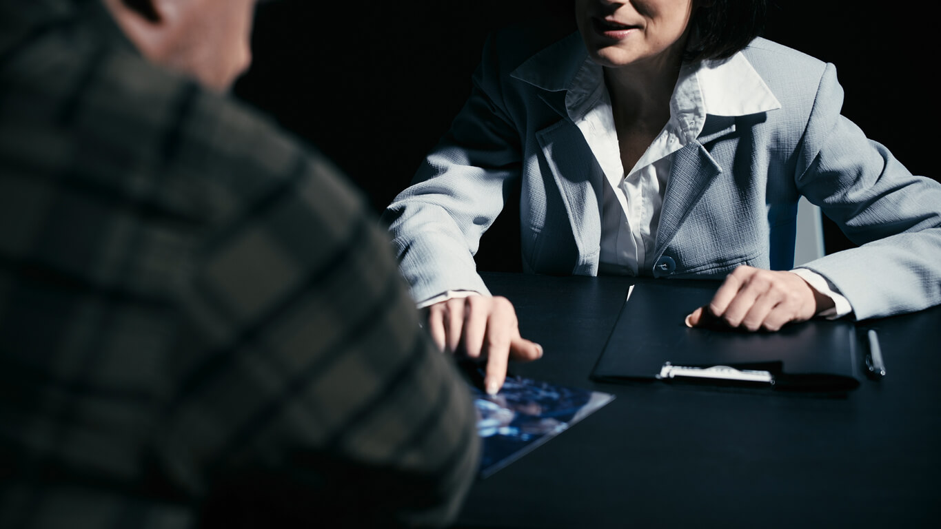 What happens after a voluntary police interview in England and Wales?